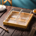 Four-compartment fruit platter with gold trim and water ripple design + wooden tray, thickened plastic