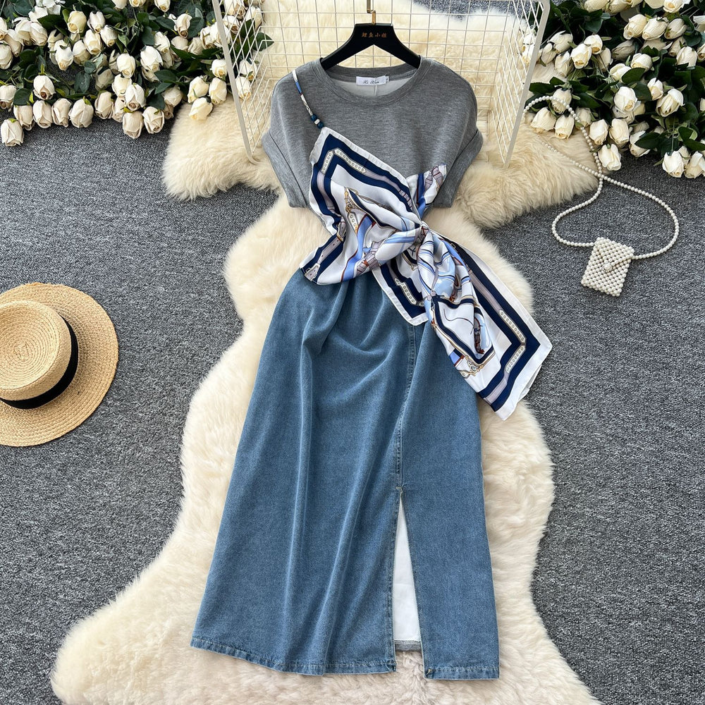 French-inspired, niche design, patchwork, tie-waist, short-sleeve denim dress for women. slimming, elegant, and features a slit midi length