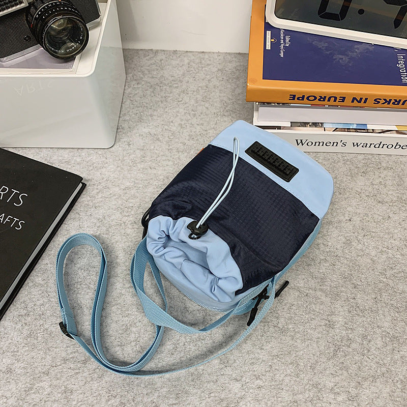 Foreign trade cute contrasting color draw belt small bag women 2025 new versatile sports and leisure shoulder messenger bag cloth bag