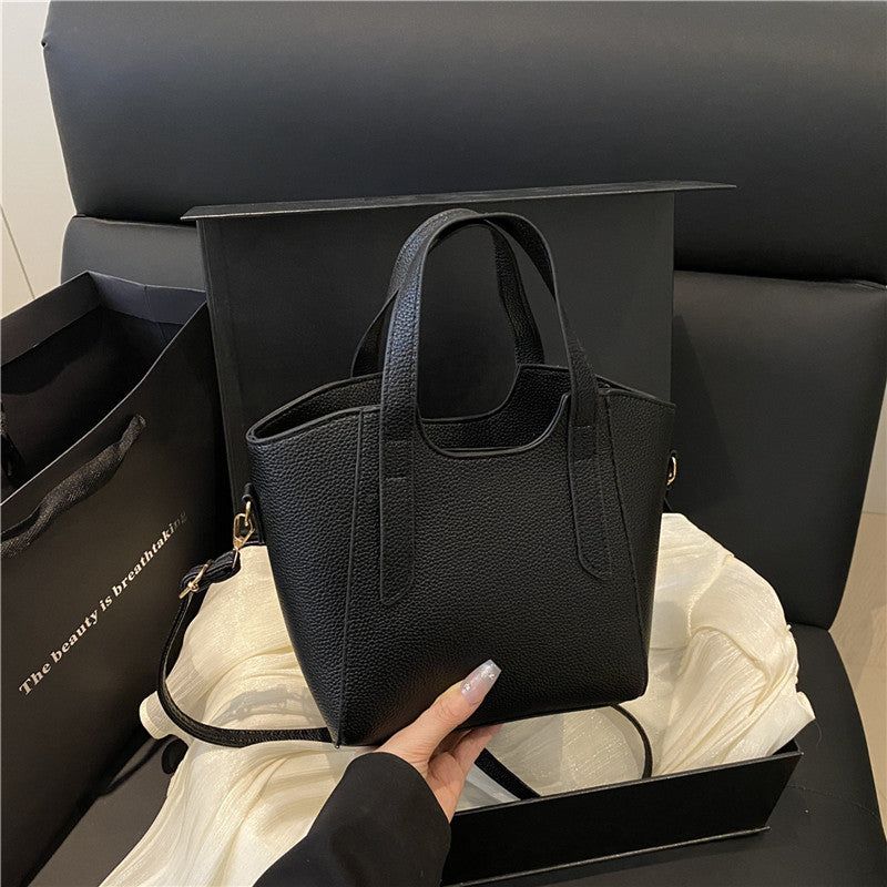 Simple and versatile portable bucket bag women's Korean version ins fashionable and simple shoulder bag 2025 new casual messenger bag