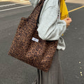 Fall and winterretro leopard print shoulder canvas bag large capacity tote bag niche styleeasiest for matchwork clothing bag college student class bag