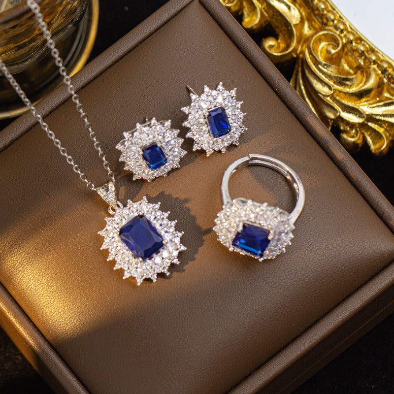 hot-selling fashion light luxury square necklace, earrings, and ring set, featuring sapphire accents. a sophisticated and versatile accessory, perfect for pairing with sweaters and other outfits