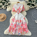 French-inspired vintage lace print dress for women, featuring a cutout design, high waist, cinched waist, a-line silhouette, and an elegant, sophisticated style