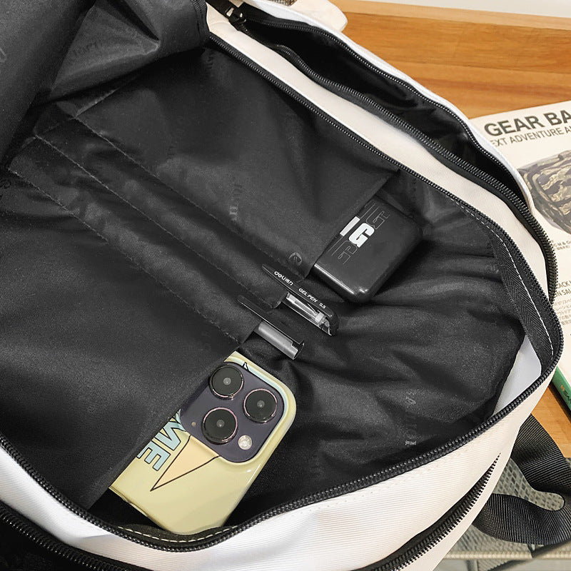 Trendy high-street water-resistant lightweight backpack - 26l large capacity student schoolbag, durable with free headphone pouch