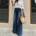 European and american style women's dark blue high-waisted wide-leg jeans - vintage washed, loose fit, flowy, floor-length flare pants
