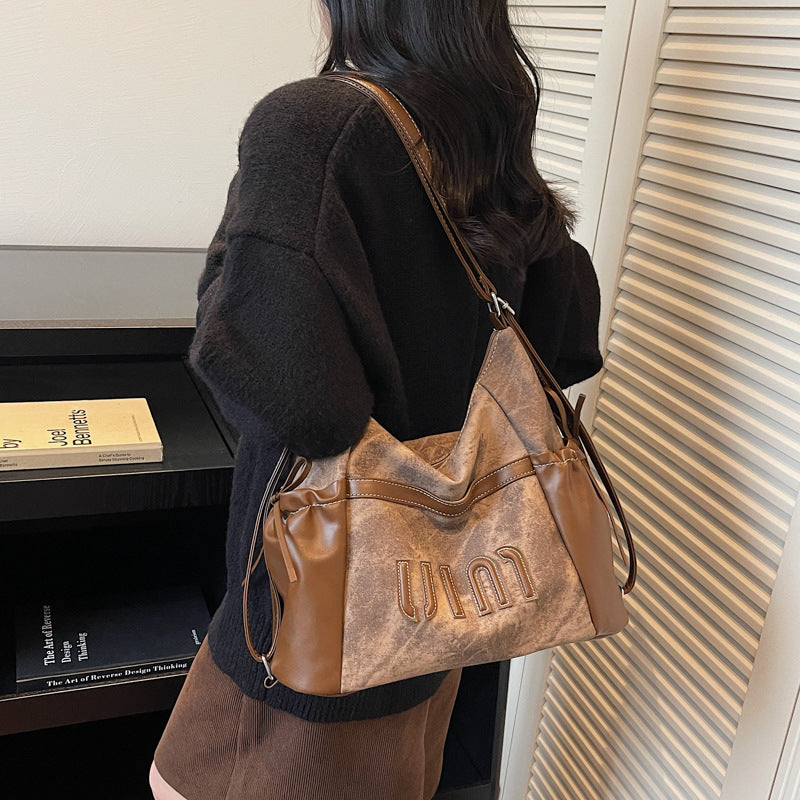 Casual retro large capacity tote bag women's 2025 new single/double shoulder backpack trendy versatile crossbody commuter bag