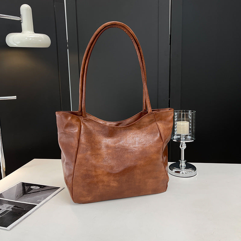 Retro style trend tote bag college students class commute armpit bag 2025 autumn and winter new shoulder portable women's bag