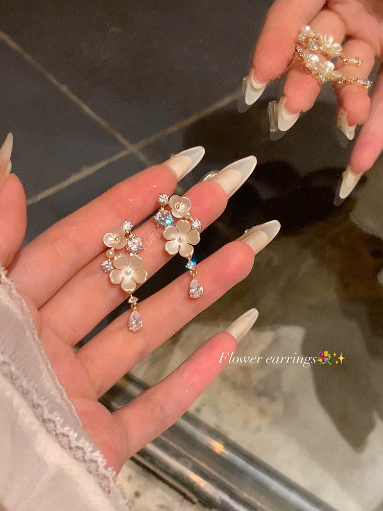 French-style cubic zirconia flower tassel earrings - women's luxury, high-end, and exquisite stud earrings. ethereal, trendy, and chic
