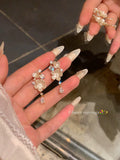 French-style cubic zirconia flower tassel earrings - women's luxury, high-end, and exquisite stud earrings. ethereal, trendy, and chic