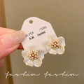 Unique elegant diamond-studded white gardenia stud earrings - exquisite, high-end, minimalist, and personalized. new trendy winter 2025 collection
