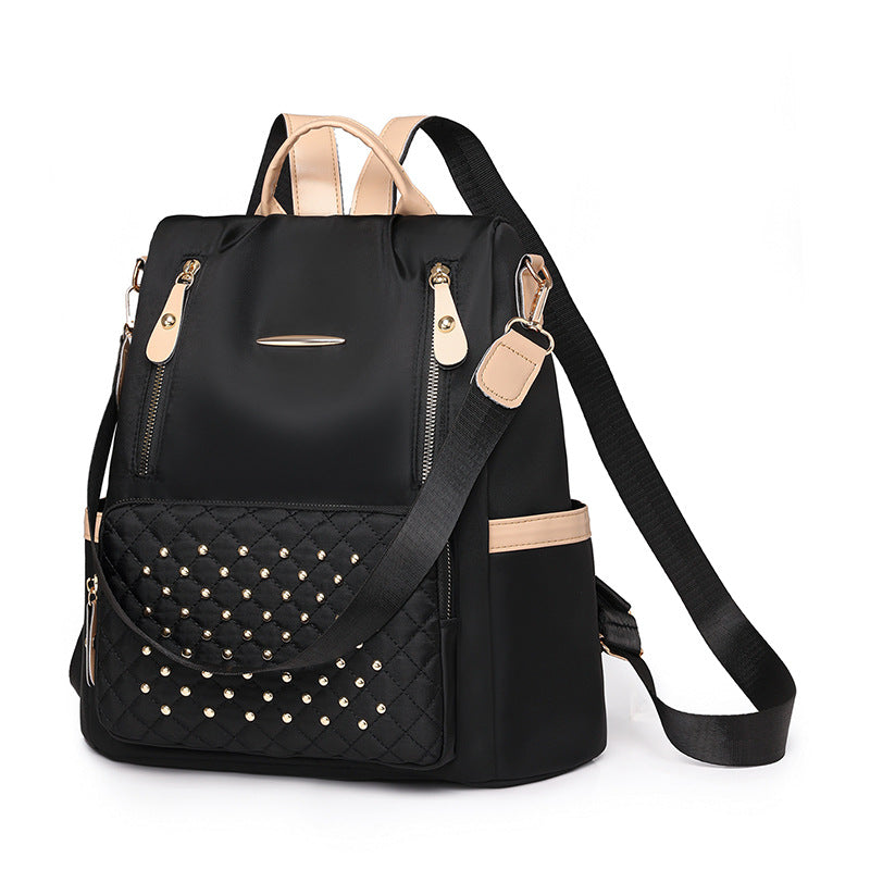 Rhombus student schoolbag large capacity fashion simple casual versatile backpack rivet inlaid women's backpack wholesale