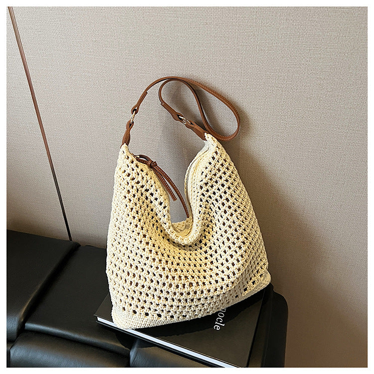 Cross-border trendy fashion hollow straw woven underarm bag women's 2025 summer simple temperament large capacity casual shoulder bag