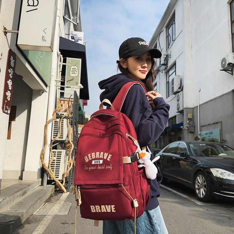 New large-capacity casual backpack, junior high school student schoolbag, fashionable and simple business travel computer backpack