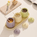 Creamy, instagram-worthy ceramic spice jar set. stylish, three-tone mixed spice jars for kitchen essentials. salt shakers available wholesale