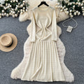 French style beaded round neck long sleeve knitted dress with cutout crochet detail and cinched waist - perfect for layering or as a long sweater dress