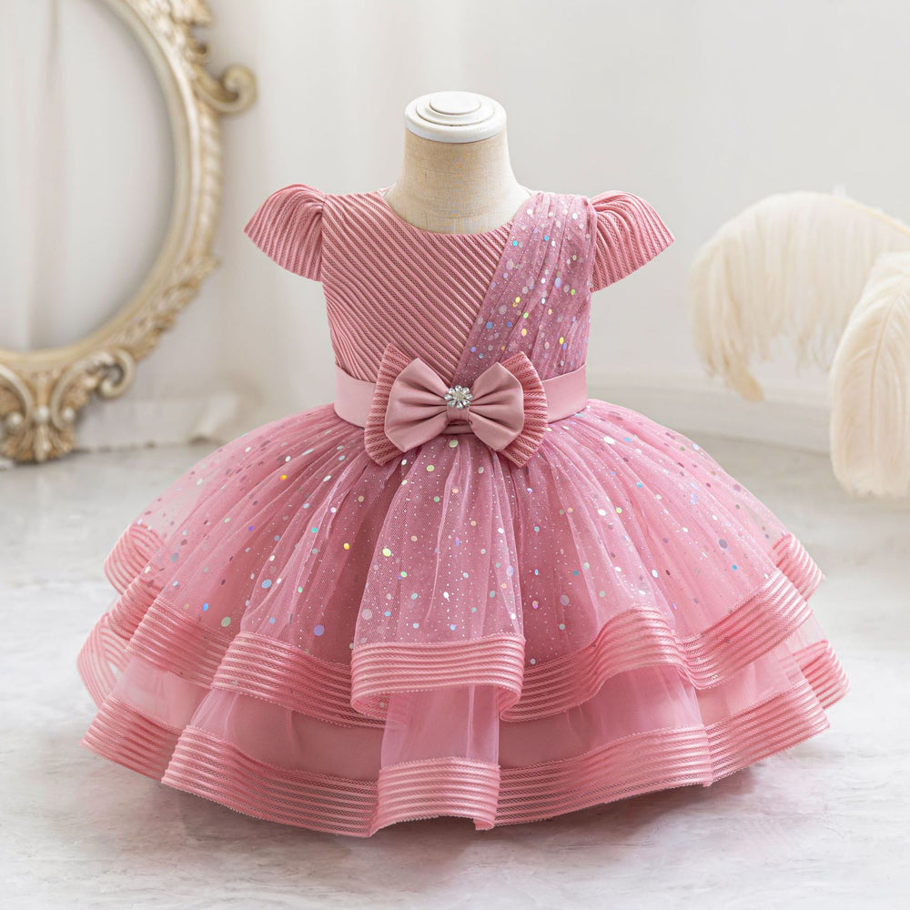 Ready-to-ship wholesale sequin bow princess dresses for girls, perfect for baby's first birthday or special occasions