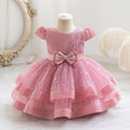 Ready-to-ship wholesale sequin bow princess dresses for girls, perfect for baby's first birthday or special occasions