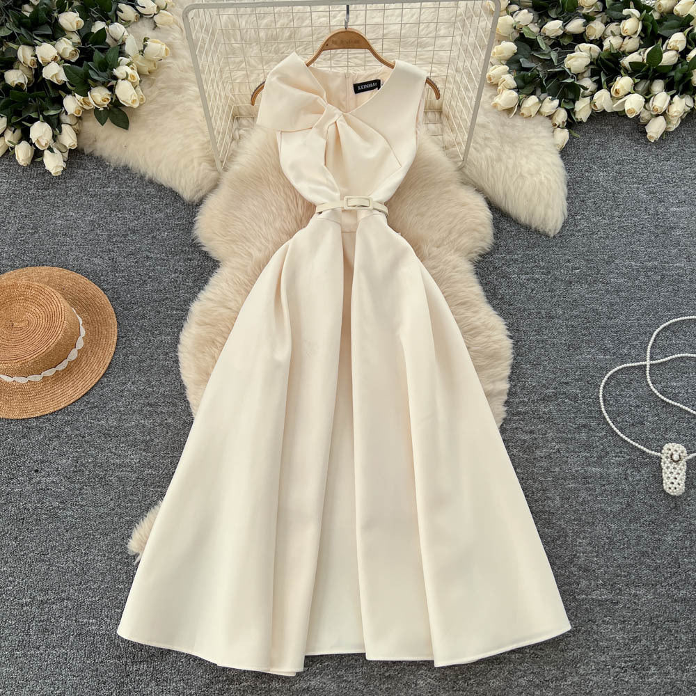 High-end women's french style formal dress - elegant, sleeveless, v-neck, cinched waist, slimming, and flattering a-line maxi dress with 3d bow detail