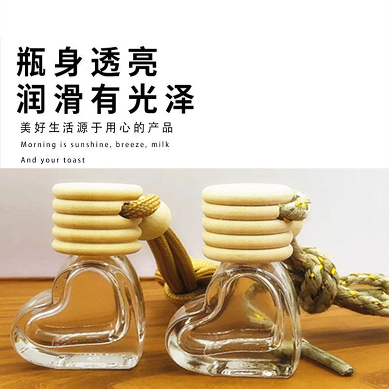 6ml new car perfume bottle pendant - heart-shaped five-line cap aromatherapy empty bottle with lanyard - creative interior car accessory (glass bottle)