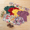 hot-selling summer ribbed, skin-friendly girls' floral print pants and top set. available in multiple colors. 100% cotton