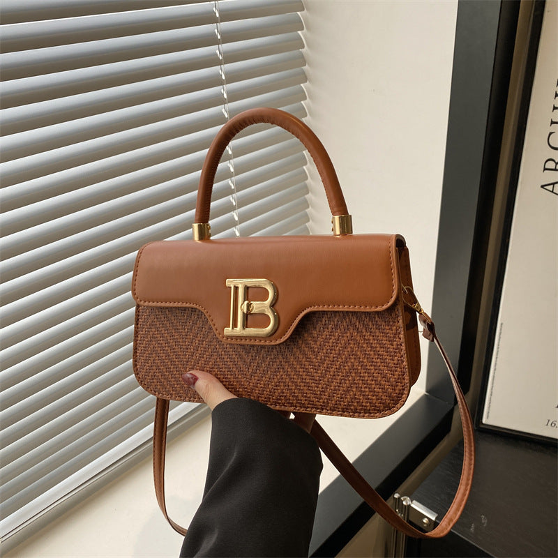 Cross-border senior design women's bag 2025 new leisure commuting practical versatile hand carry shoulder messenger bag