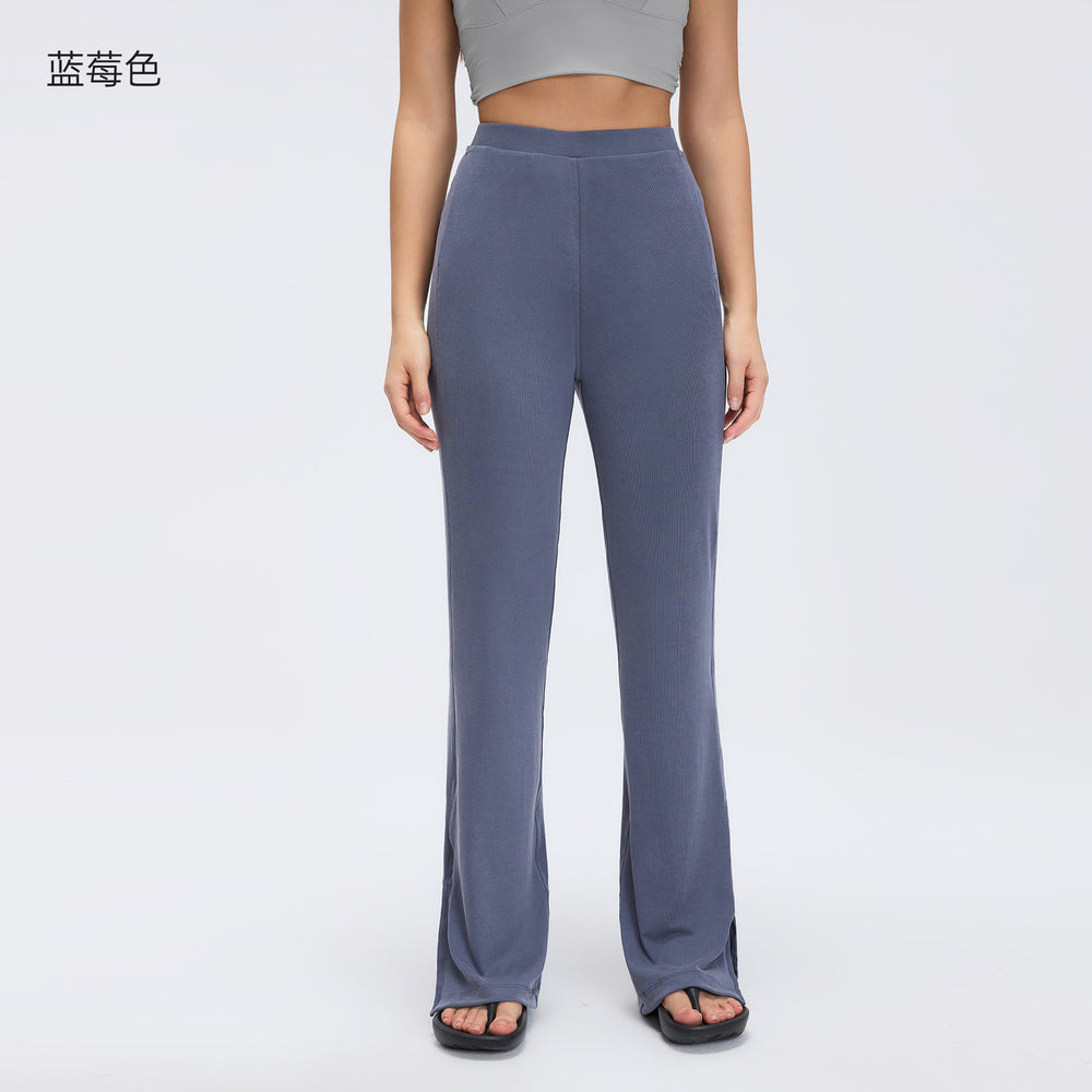 Sand-washed ribbed yoga pants for women, loose-fitting, with a flattering drape and slimming effect. wide-leg, slightly flared, with a slit detail. perfect for sports and fitness. style d26024