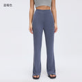Sand-washed ribbed yoga pants for women, loose-fitting, with a flattering drape and slimming effect. wide-leg, slightly flared, with a slit detail. perfect for sports and fitness. style d26024
