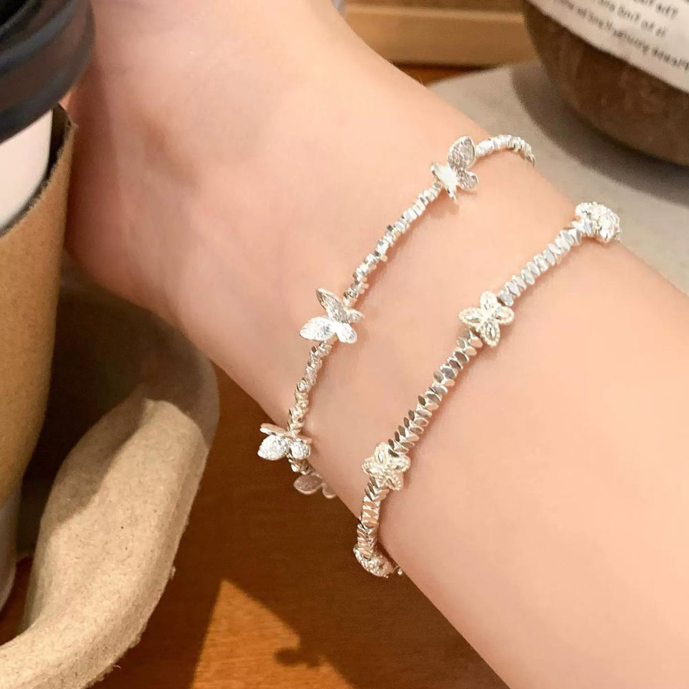 Elegant butterfly bracelet with crushed silver beads - 2026 new arrival, light luxury, niche design, exquisite and high-end style, wholesale for women