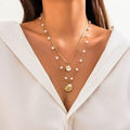 European and american cross-border jewelry: ocean-themed metal starfish and seashell necklace set with designer faux pearl chain