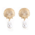 Wholesale ocean breeze earrings: european and american cross-border jewelry, versatile scallop-shaped, niche, high-end faux pearl pendant earrings for women