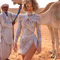 spring/summer new arrivals: european and american style sexy long-sleeve dress with gold and silver tassel detail and slit – evening gown