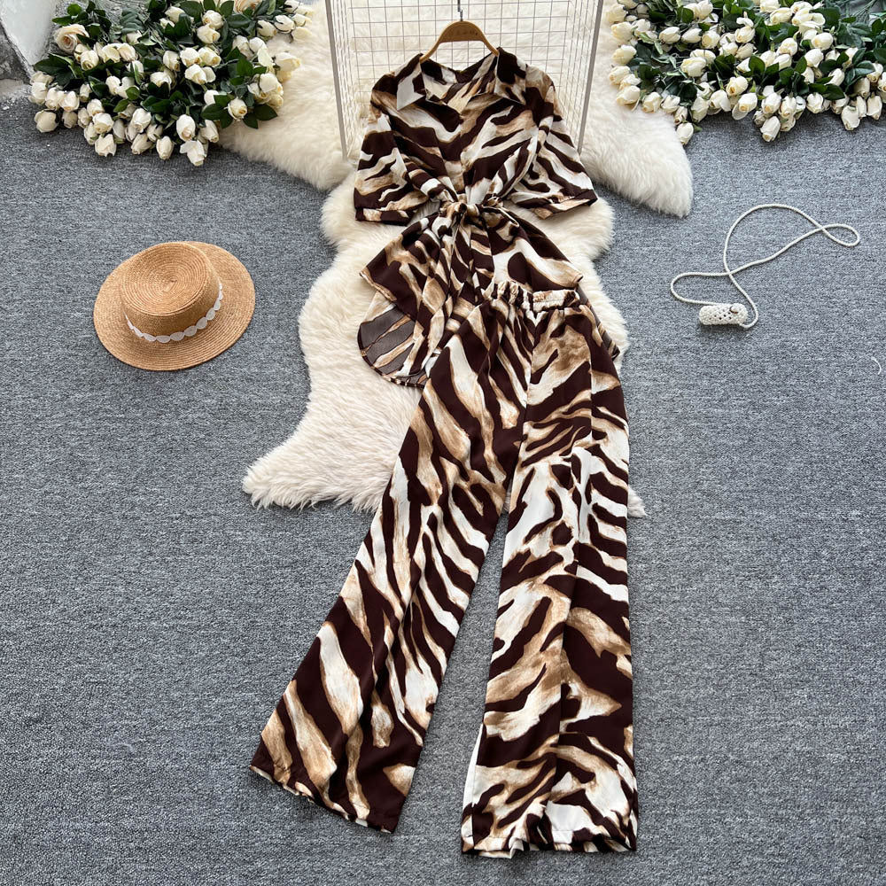 European style fashion print set - women's summer chic: tie-waist asymmetrical blouse & high-waisted wide-leg straight pants