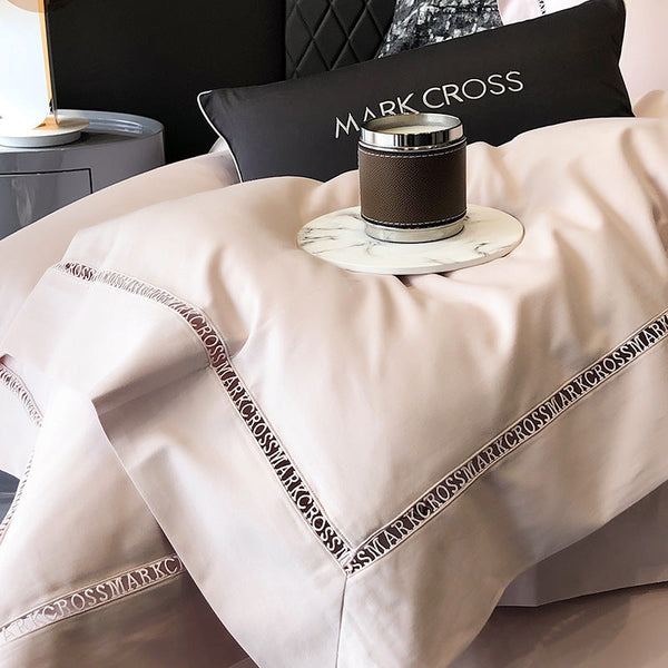 Simple solid color 100 cotton abraded four-piece set hollow edge quilt cover autumn and winter naked sleeping double skin-friendly light luxury style