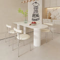 Creamy white rock slab dining table and chair set - modern minimalist semi-circular dining table for small spaces