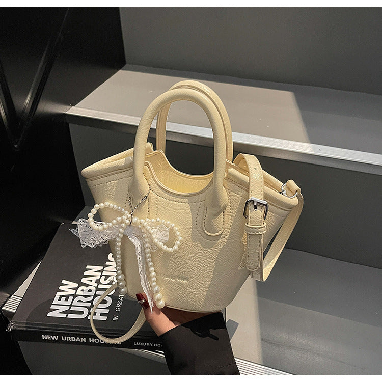 Cross-border texture contrasting handbag bag 2025 new fashionable versatile foreign gas bucket bag casual simple messenger bag