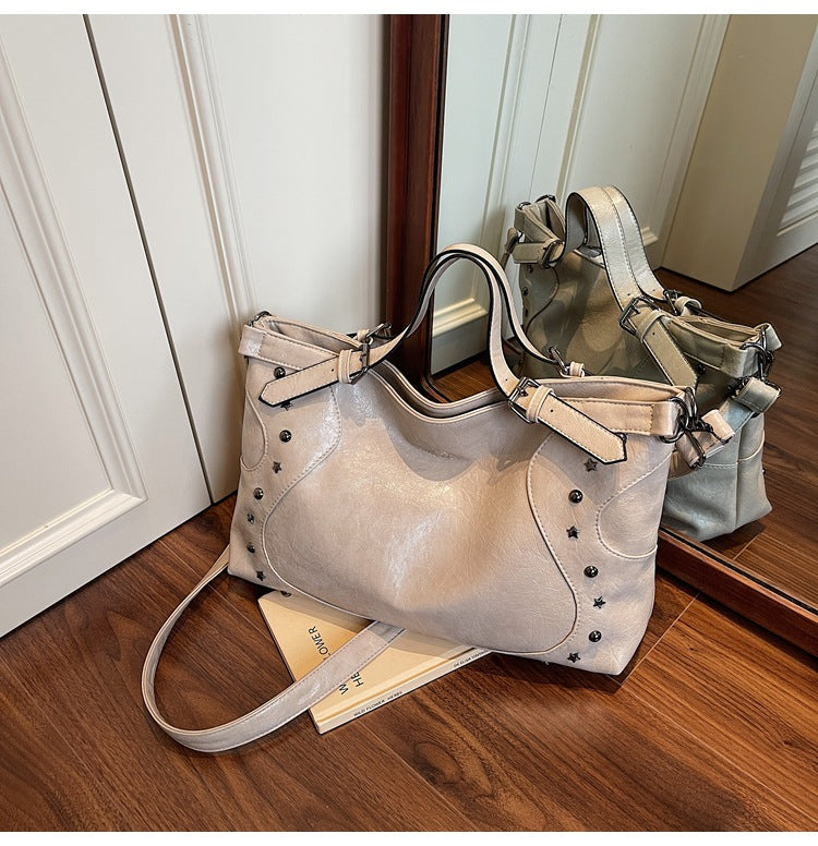 Cross-border retro bag women's large capacity 2025 new summer casual messenger bag rivet portable commuter tote bag