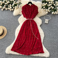French-inspired v-neck floral chiffon dress with flared sleeves, tie waist, and a figure-flattering, vintage-inspired silhouette