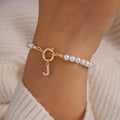 European and american cross-border faux pearl bracelet with 26 english alphabet pendant design - minimalist chic handmade beaded jewelry