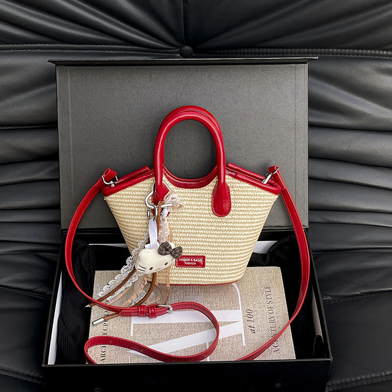 Handheld bucket bag women's new sense niche this year messenger bag fashion trend small bag