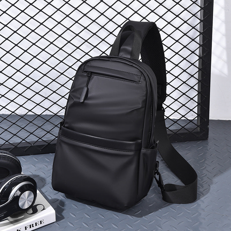 Factory goods chest bag men's new trend casual leather film chest bag anti-splashing multi-functional messenger bag chest bag men