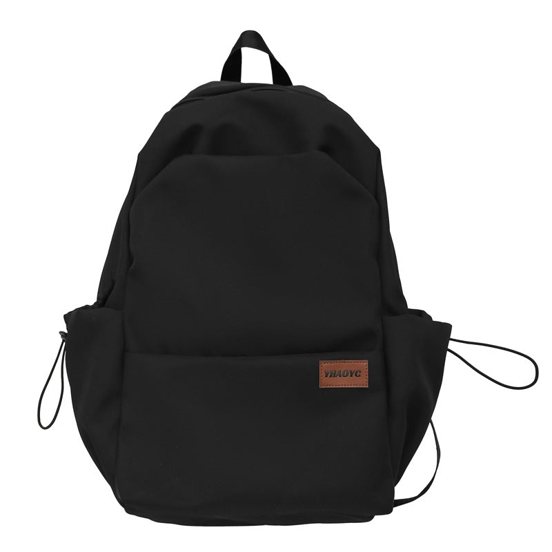 New solid color junior high school student large-capacity backpack male backpack schoolbag male college student business travel backpack