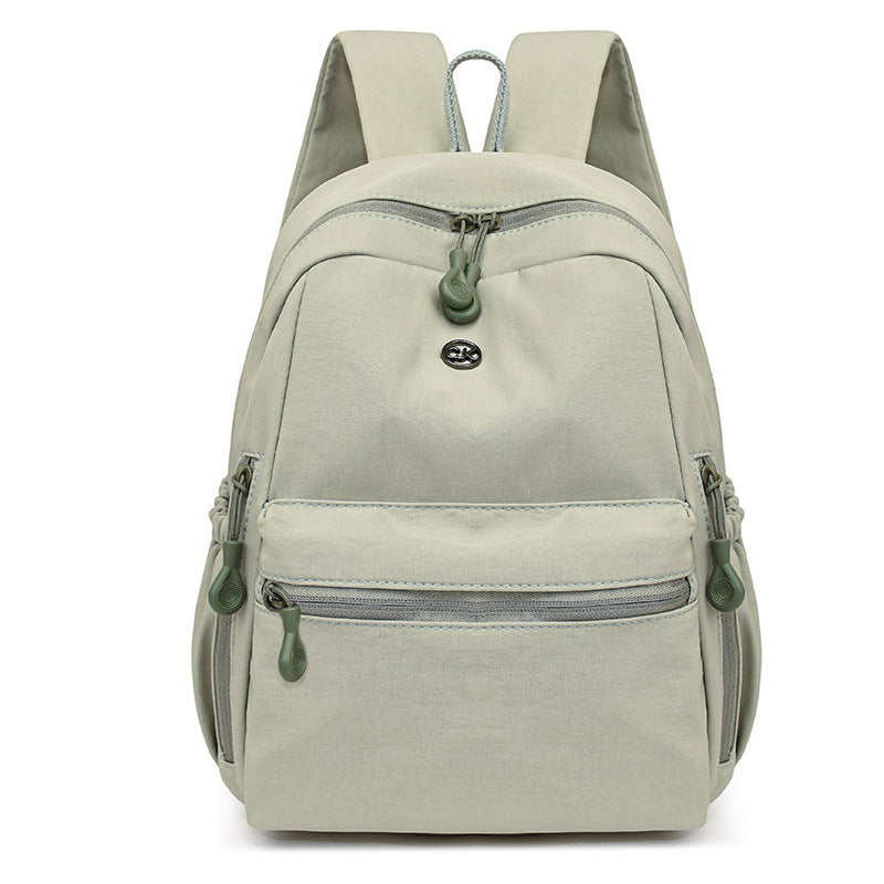 New double shoulder schoolbag Korean version casual simple versatile lightweight backpack solid color large capacity commuter bag double shoulder women's bag