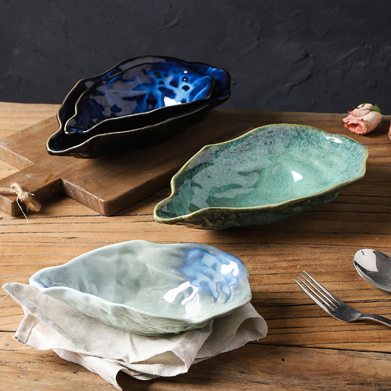 Japanese kiln-turned ceramic flavor dish stylish restaurant hotel oyster-shaped high-value dessert small dish dipping soy sauce dish