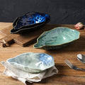 Japanese kiln-turned ceramic flavor dish stylish restaurant hotel oyster-shaped high-value dessert small dish dipping soy sauce dish