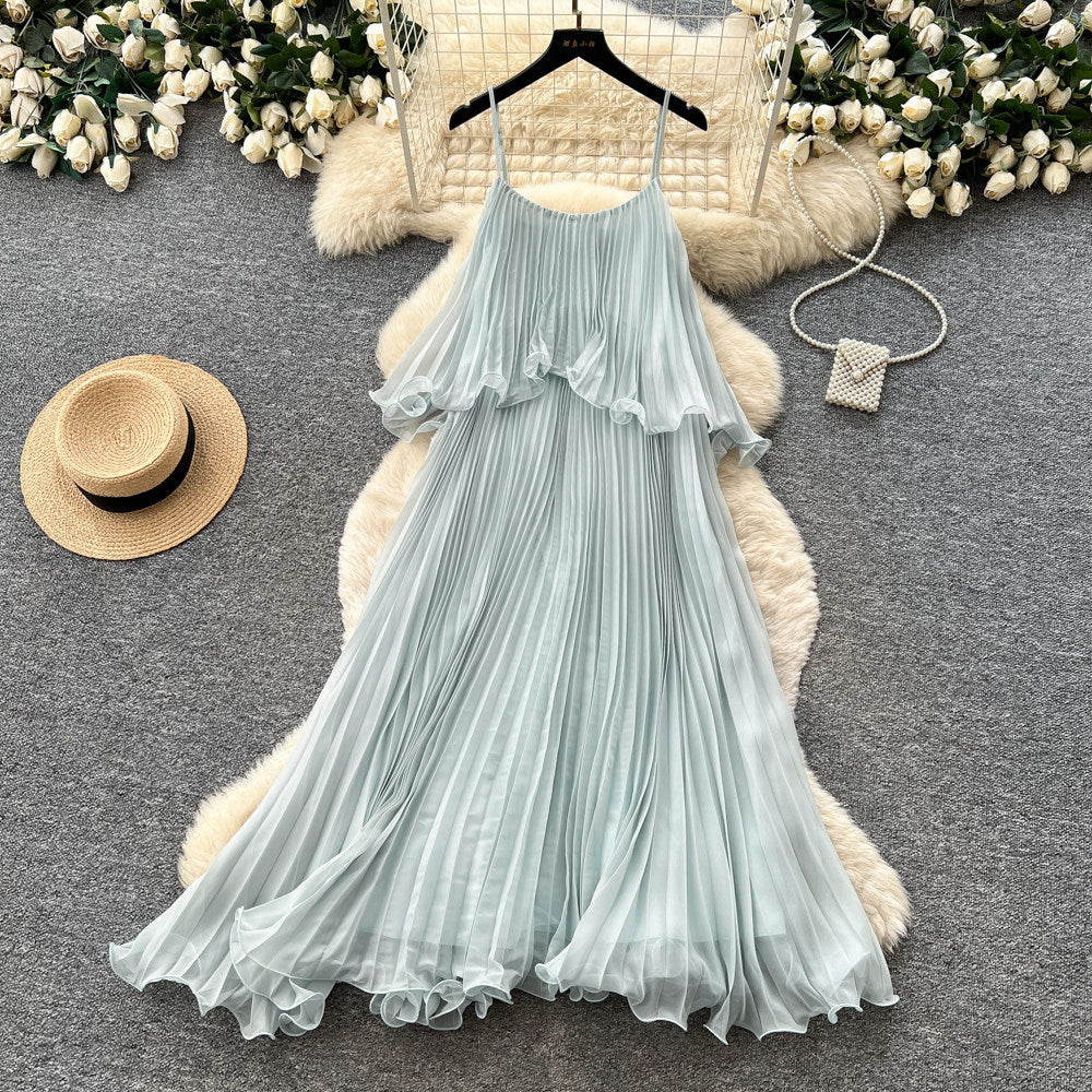 Vacation-style light blue camisole sleeveless dress for women, featuring a summer ruffle trim, high waist, slimming effect, and pleated fairy-length skirt