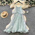 Vacation-style light blue camisole sleeveless dress for women, featuring a summer ruffle trim, high waist, slimming effect, and pleated fairy-length skirt