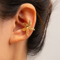 Gold earrings wholesale 2025 new european and american cross-border alloy jewelry niche accessible luxury starfish earrings women's ear cuff