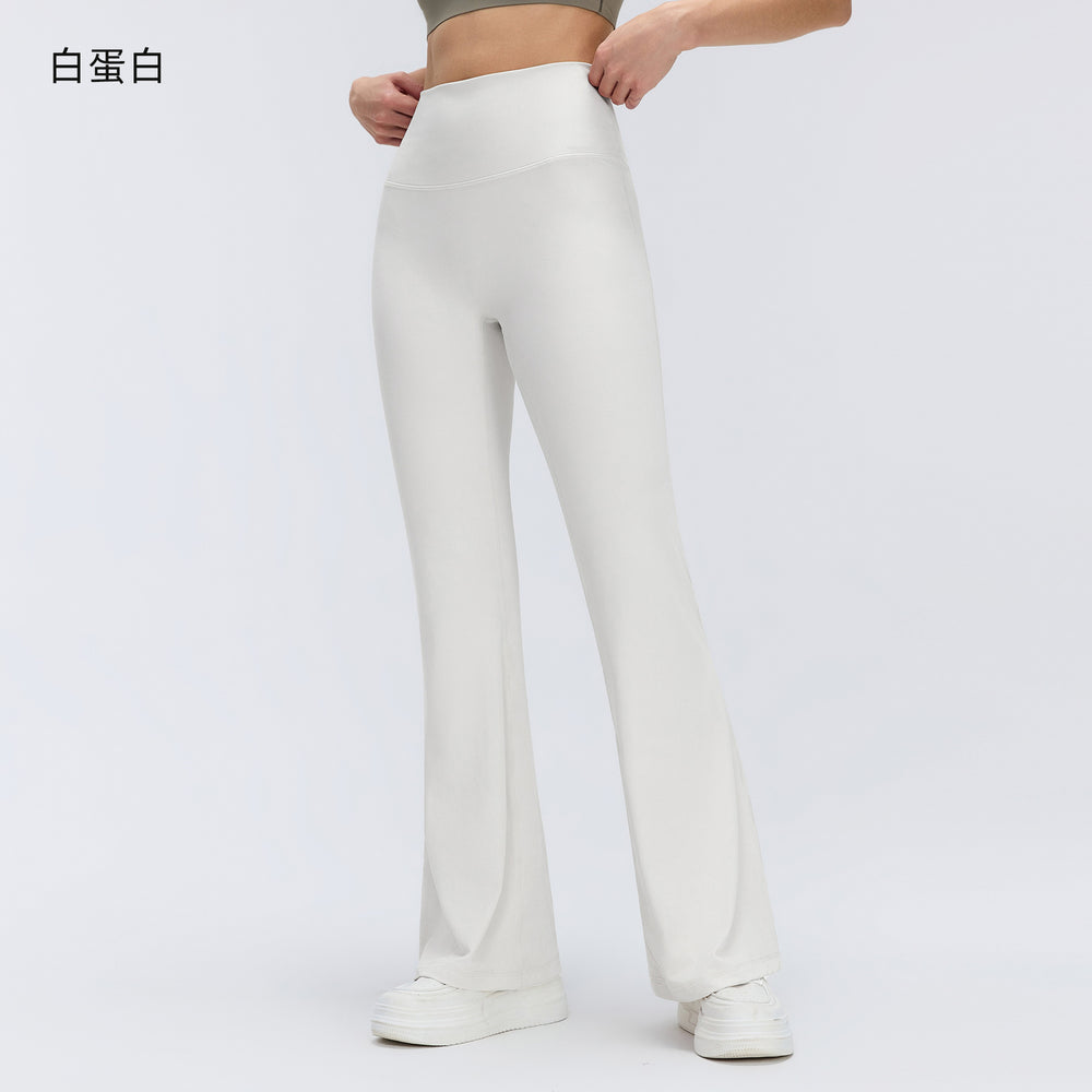 High-waisted, slightly flared yoga pants for women, designed to lift the hips, flatten the tummy, and create a slimming silhouette. these stretchy, barely-there feel leggings are perfect for pilates and other fitness activities. style d26017