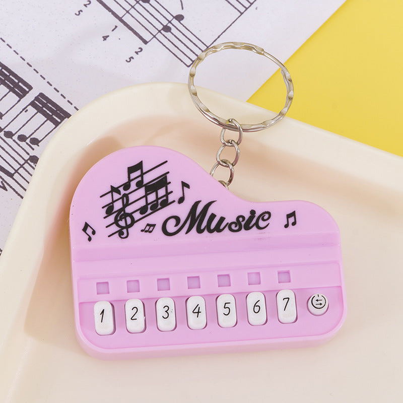 Mini pocket piano keychain - kids' electronic keyboard cartoon keychain pendant - playable, light-up creative toy
