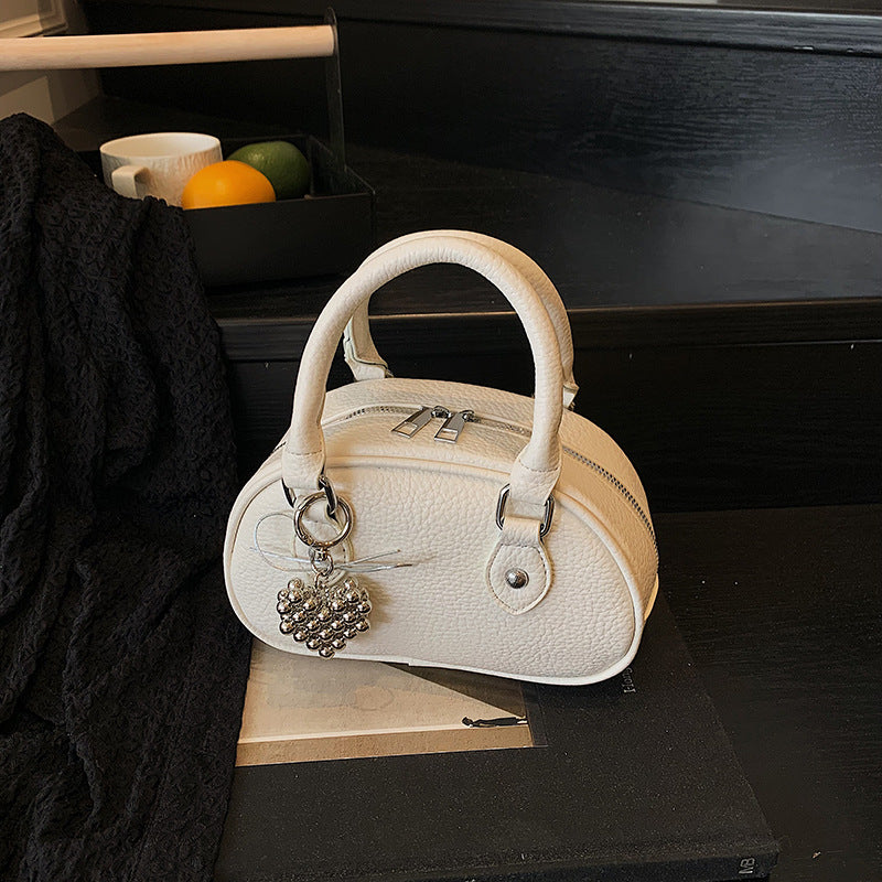 high-end niche 2025 new versatile shoulder cross-body women's bag bowling small square bag fashionable shell bag